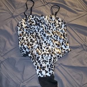 Snow leopard bodysuit faux leather